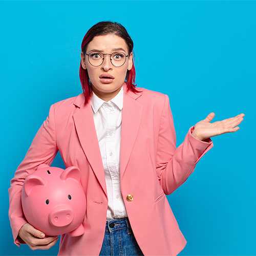 A confused student stands shrugging with a piggy bank