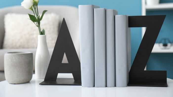 A and Z shaped bookends holding up a handfull of books