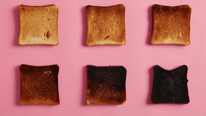 multiple pieces of toast progess in blackness as you go down