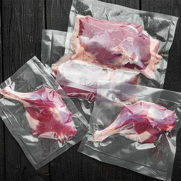 Fresh duck meat sealed in clear packaging