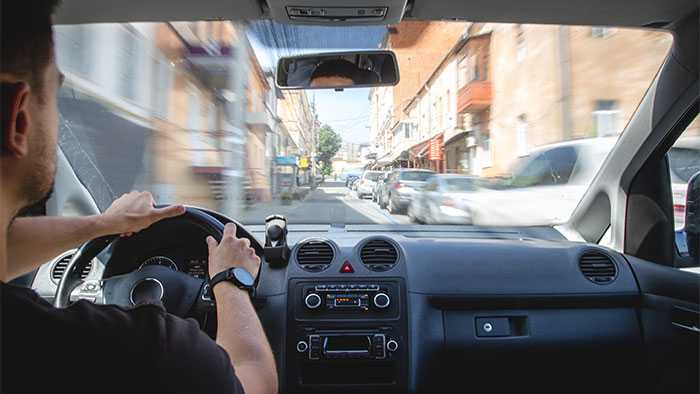 photo hands on the wheel when driving at high speed from inside the car